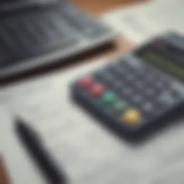 Close-up of a calculator and financial documents representing auto loan evaluation.