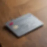 Close-up of a Capital One Platinum credit card on a wooden table