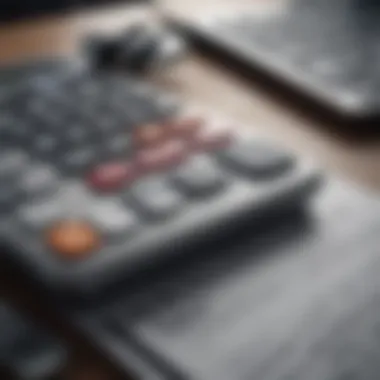 A close-up of a calculator and a budgeting plan