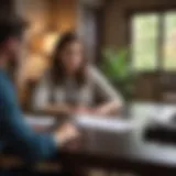 A couple discussing financial plans at a table with documents.