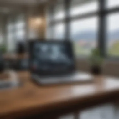 An elegant office setting with a laptop and a notebook on a table