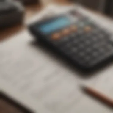 A calculator with financial documents laid out