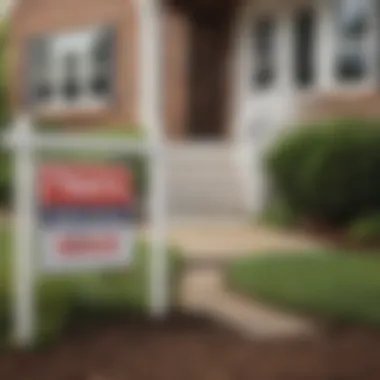 A close-up of a house for sale sign in front of a well-maintained property.