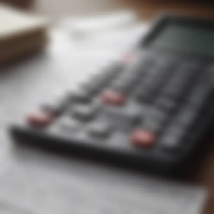 A close-up of a calculator and financial documents representing calculations