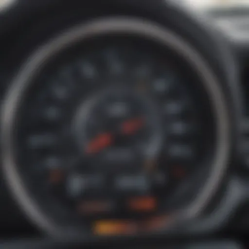 A close-up view of a car's dashboard showcasing the odometer and fuel gauge.