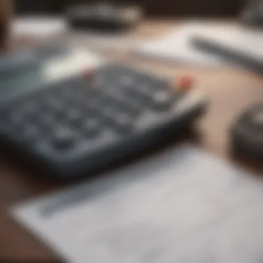 A calculator and loan application form on a table